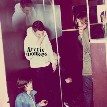 Arctic Monkeys — Humbug era promo photo, band members in a red-lit room